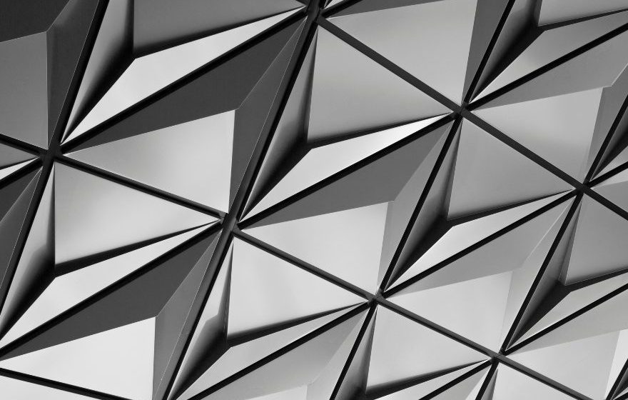 Geometric pattern of interconnected triangles in black and white