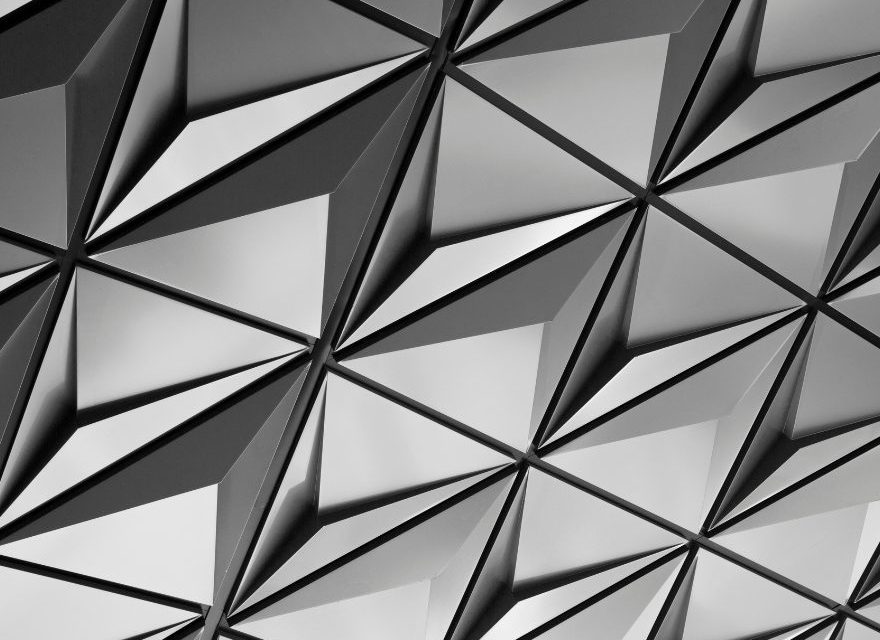 Geometric pattern of interconnected triangles in black and white